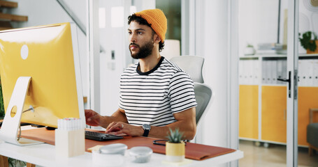 Creative, designer or man on computer to research for artistic project, digital media or video editing. Producer, male editor or PC monitor for content creation, post production or filmmaking process