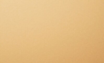 Close-up of a smooth, warm golden surface with subtle texture and depth.