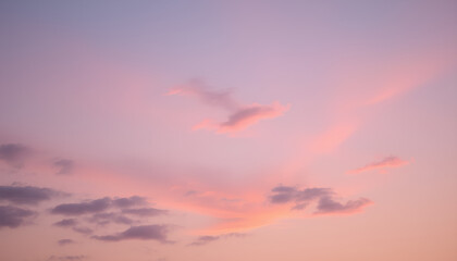 Obraz premium Romantic sky during twilight where clouds subtly form the shape of a heart, glowing with soft pink and purple hues 2