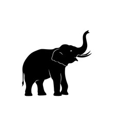 Obraz premium Majestic Silhouette: An elegant silhouette of a towering elephant, its trunk raised in a symbolic gesture, conveys strength and poise.