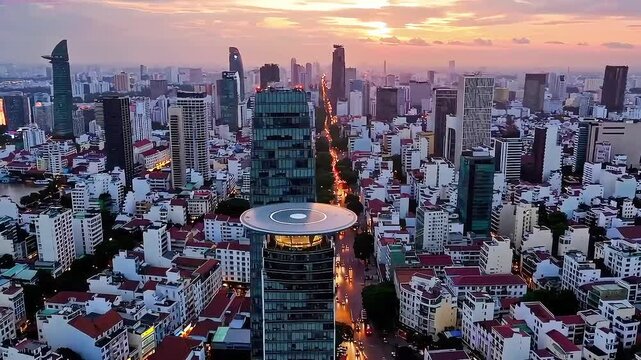 Sunset aerial of saigon cityscape showing modern buildings and urban architecture in downtown ho chi minh south vietnam.