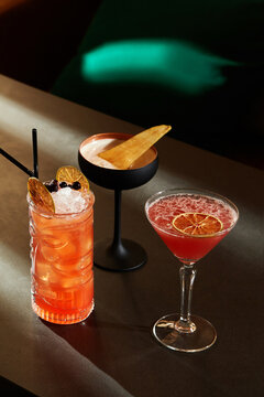 Bartender preparing exotic cocktails with tiki style and modern touches