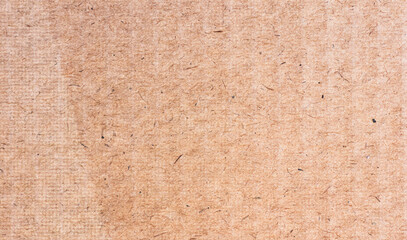 A sheet of recycled cardboard texture as background