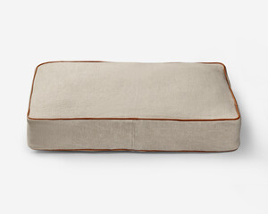 Comfortable pet bed resting on white background