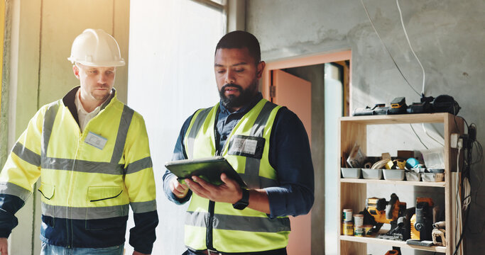 Men, tablet and teamwork for inspection or construction, industrial planning and building renovation of development. Engineer, collaboration and project management with maintenance for infrastructure