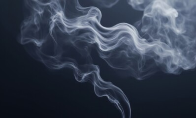 Elegant wisps of gray smoke gracefully swirling against a dark backdrop.