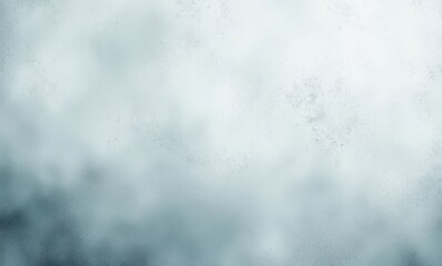 Soft gray abstract background with a smooth, misty texture.