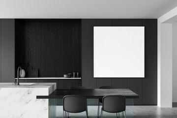 Fototapeta premium Modern interior kitchen and dining area with minimalist dark cabinetry, marble island, and blank canvas on wall in contemporary style. 3D Rendering