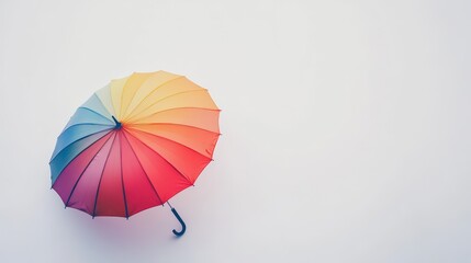 Vibrant Rainbow Umbrella Isolated on White Background with Copy Space