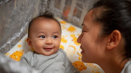 Infant lying in crib gazing at mom with joy as she talks and interacts warmly.