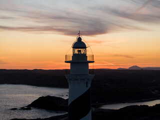 Faro de Favaritx al atardecer en la Isla de Menorca, Baleares