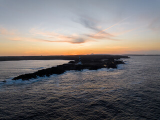 Faro de Favaritx al atardecer en la Isla de Menorca, Baleares