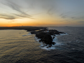 Faro de Favaritx al atardecer en la Isla de Menorca, Baleares