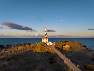 Faro de Favaritx al atardecer en la Isla de Menorca, Baleares