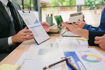 Finance marketing research reports paper close up, economic sales statistics documents lying on office desk, business people planning organization process