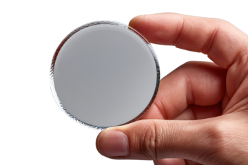 Hand holding a round mirror, reflecting light, white isolate background.