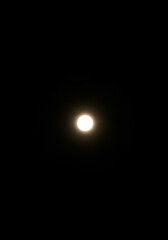 Bright moon in black sky