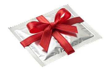A wrapped red gift box with a red ribbon bow is a festive present for any holiday celebration
