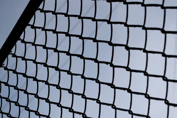 chain link fence with barbed wire