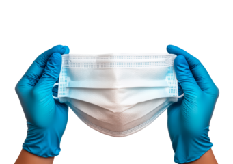 Gloved hand holding face mask isolated on transparent background