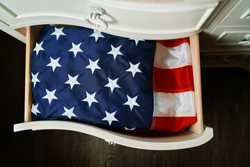 American flag tucked in drawer with vintage appeal