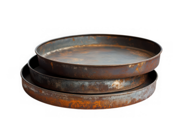 Stack of three rustic metal baking pans round trays vintage cookware kitchenware rusty texture isolated on transparent background