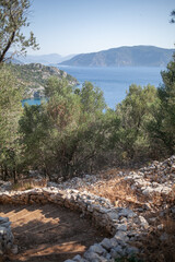 Ancient winding path with the sea background