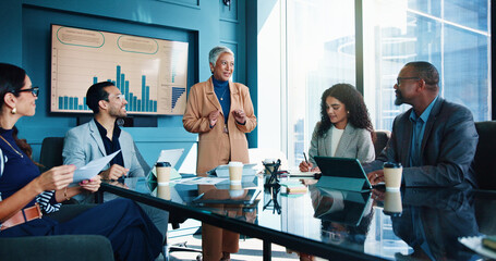 Excited, presentation and business people in meeting, charts and financial success. Speaker, group...