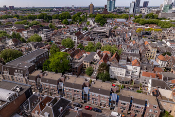 Fototapeta premium Modern build real estate houses in city center of Utrecht, The Netherlands. Aerial Dutch medieval urban city planning development. Holland tourist destination