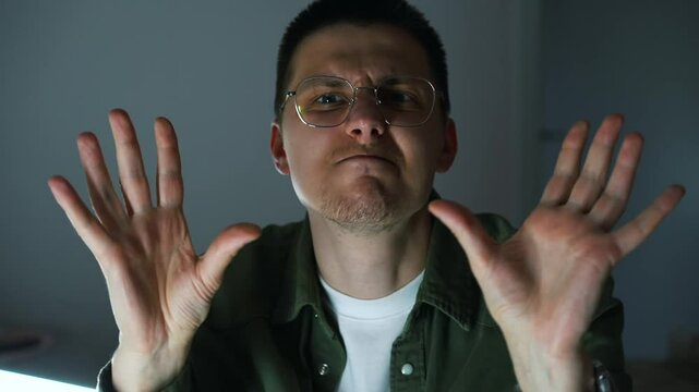 Happy Italian man in vision glasses is very delighted.
Bellissimo gesture with hands.
A man kisses his hands and shows that everything is perfect and excellent.
Italian gesture of a guy