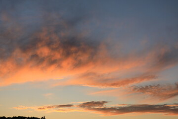 the clouds and blue sky in the sunset