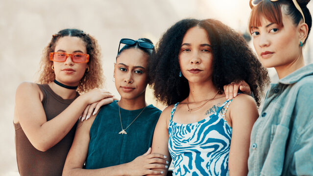 Portrait, friends and women in city for fashion with streetwear, edgy clothes and confident. Cool, group and girls outdoor with trendy sunglasses, urban outfit and serious with gen z style for swag