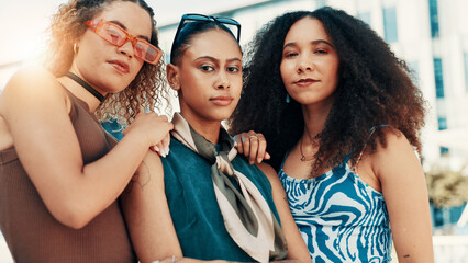 Portrait, group and women with fashion, outdoor and diversity with urban town, bonding together and edgy. Face, friends or people in city, gen z and female empowerment with stylish outfit or trendy