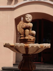 An elegant Artisan Fountain Sculpture that blends art with a water feature for outdoor spaces