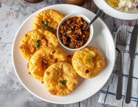 Traditional Sri Lankan hoppers served with spicy dhal curry and coconut sambal