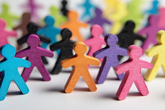 Colorful Wooden Figures: A Vibrant Crowd in Playful Harmony
