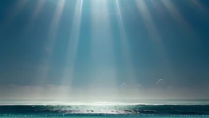 Sun rays pierce through the cloudy sky over the blue sea, creating a beautiful and abstract light on the water's horizon