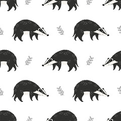 Seamless pattern with cartoon style badgers characters and decorative leaf design elements repeated on white background.