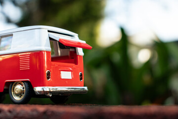 A toy car in the park. After edits.