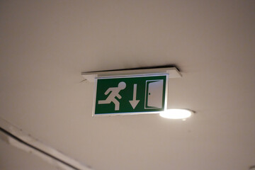 emergency exit sign on a wall