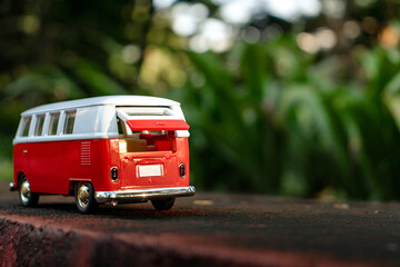 A toy car in the park. After edits.