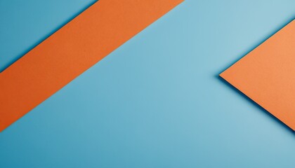 Backdrop of blue and an orange paper
3