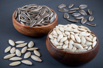Pumpkin seeds with sunflower seeds in bowl,top view