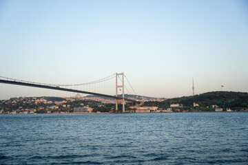 Bosphorus Bridge view from the middle of the Bosphorus with scenic cityscape