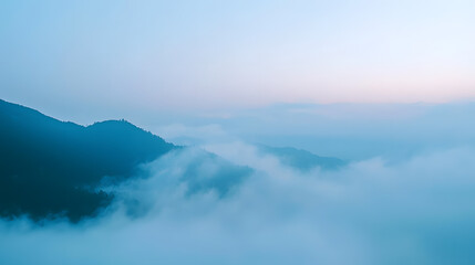 Soft atmospheric transition mountain range nature landscape misty environment aerial view sky blue concept