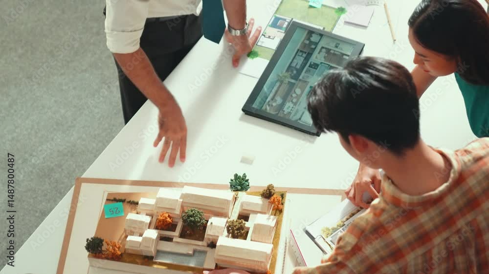 Poster professional architect engineer sitting while explain house plan to manager. aerial view of smart de