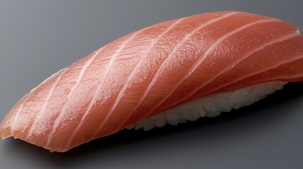 Tuna sushi with closeup, and dark background.