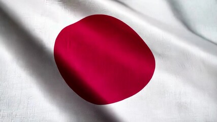 Japanese national flag with red circle on white background gently waving, representing peace, identity, and traditional culture in daylight - Powered by Adobe