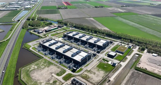 data center, computing center, hyperscaler, computer servers, cloud services, it services, aerial view. Building exterior.