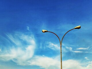 street lamp on blue sky background